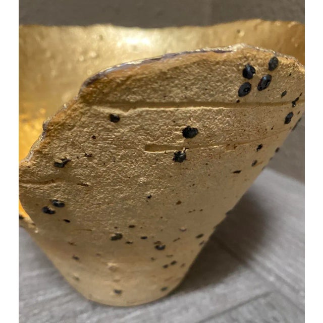 Fluted shaped Ceramic Vessel with interesting flecked exterior. Gold with charcoal specks. Purchased at the Oregon Potters...