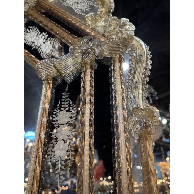 The Vintage Murano Etched Glass mirror exudes a retro charm with its intricate etched design, adding a touch of nostalgia...