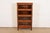 A gorgeous antique Arts & Crafts four-stack barrister bookcase By Stow Davis USA, Circa 1920s Mahogany, with glass front...