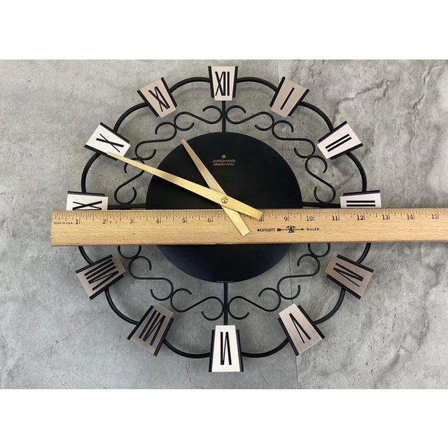 Add an exceptional piece of German horological design to your space with this striking Mid-Century Modern wall clock by...