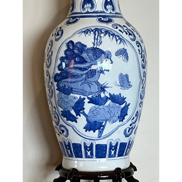 Late 20th Century Large 19" Chinese Blue & White Porcelain Peacock Vase & Carved Wood Stand For Sale - Image 9 of 9