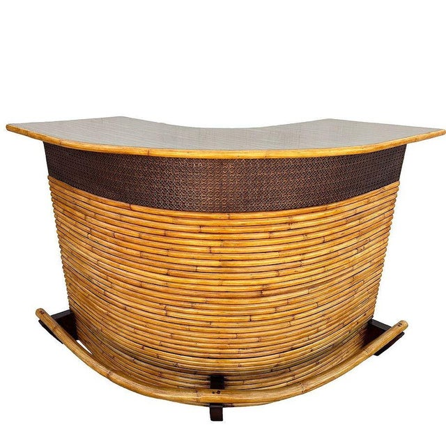 This beautifully restored, Large 68" wide stacked rattan curved Mid-century dry bar. The bar has two shelves along the...
