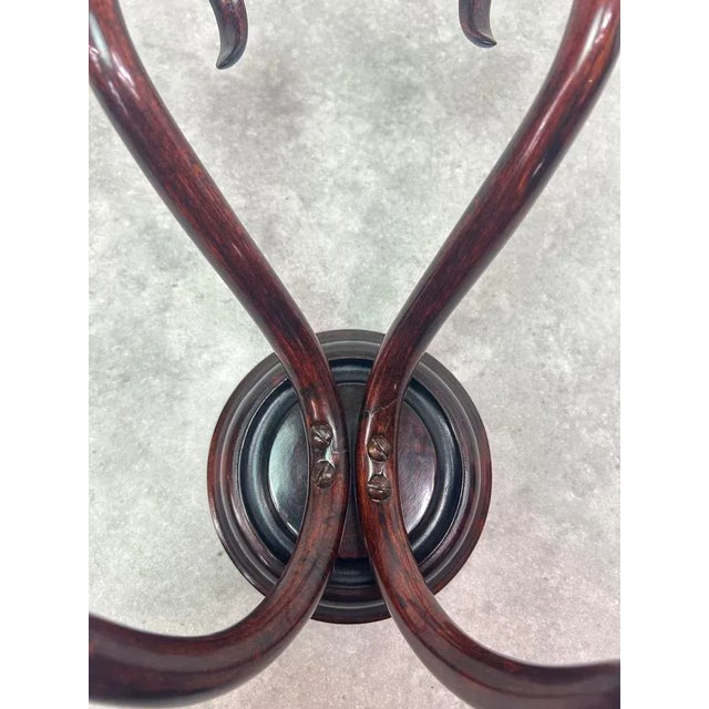 Thonet wall rack no.2 professionally stained and repolished. This piece is attributed to the mentioned designer/maker. It...