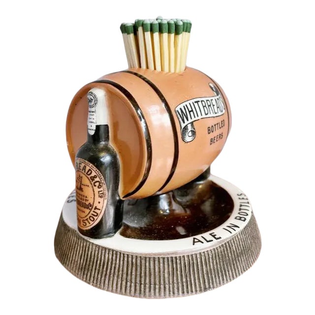 An antique English stoneware match strike, made to be used in a pub to advertise Whitbread’s ale and stout beer. In...