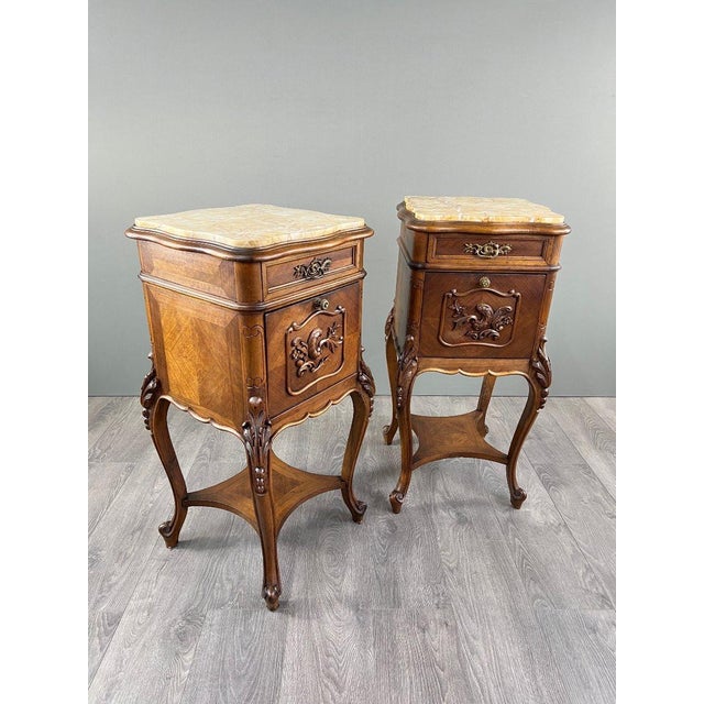 Pair of Louis XV bedside tables, yellow marble, 19th century An elegant pair of bedside tables in solid walnut, dating...