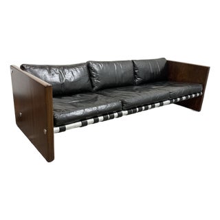 Selig Rosewood + Black Leather Strap Sofa, Circa 1970's For Sale
