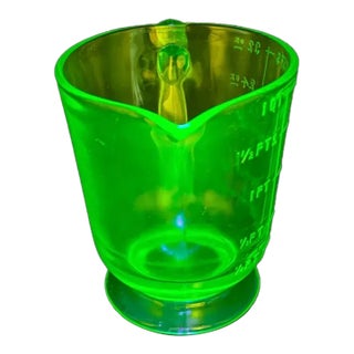 Vintage Depression Uranium Glass Footed Measuring Cup For Sale
