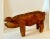 A hand Carved Wooden Pig - a compliment to many settings - great in the kitchen, on a shelf, console table, or even staged...