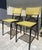 Pair of French Art-Prog Chairs, Yellow Woven Plastic and Black Tubular Steel, 1950s Elegant pair of French mid-century...
