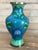 Add a vibrant touch of global flair to your decor with this vintage Chinese cloisonné vase. The hand-enameled metal body...