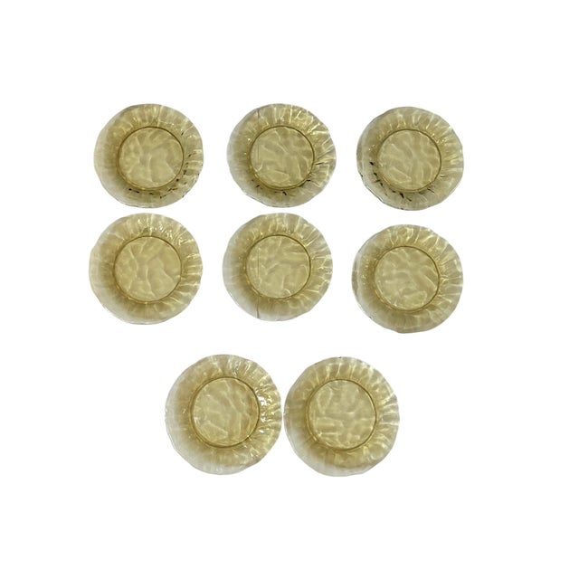 This eight-piece set of olive green crinkle glass plates from the 1950s by Morgantown is a charming addition to any...