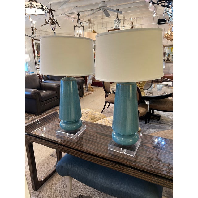 Eye catching and elegant vintage pottery table lamps in an impressive scale and color. The soft cerulean blue is a great...