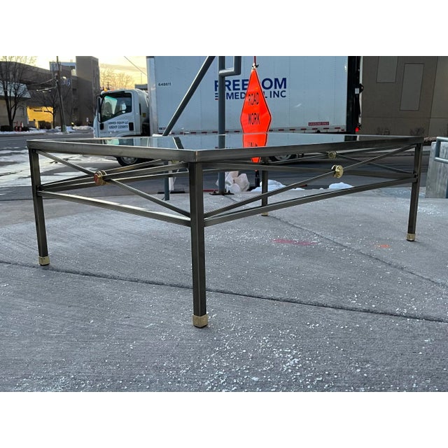 Vintage #84349 gunmetal grey cocktail or coffee table of classic x form design having brass medallions capped feet and...