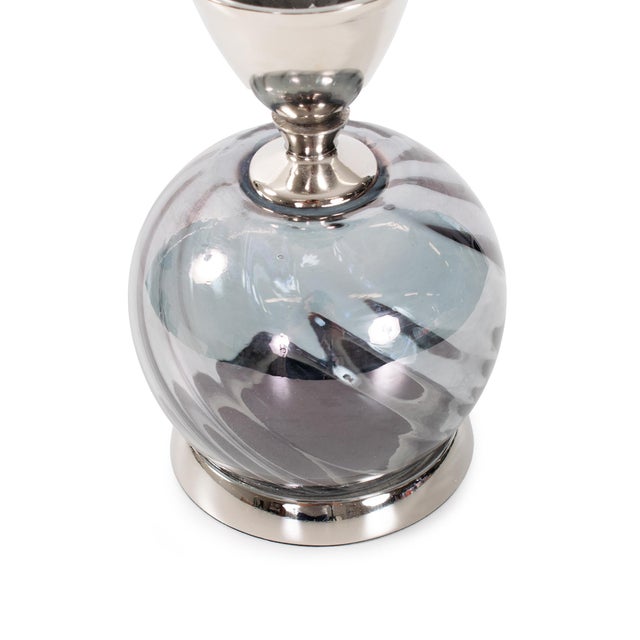 With its subtle smoky hue, faceted texture, and gleaming nickel base, this piece brings refined sophistication to any...