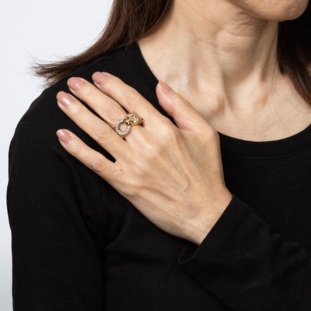 Finely detailed vintage panther ring crafted in 14k yellow gold (circa 1970s to 1980s). Diamonds total an estimated 0.20...