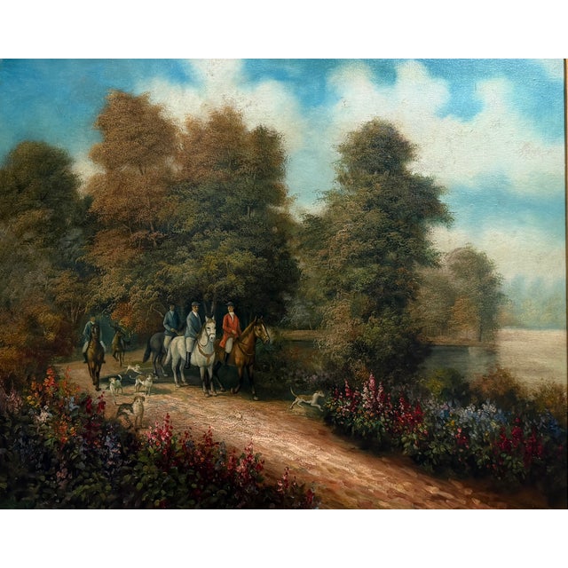 This vintage oil on canvas depicts an elegant country hunt scene with mounted riders and hounds traveling along a woodland...