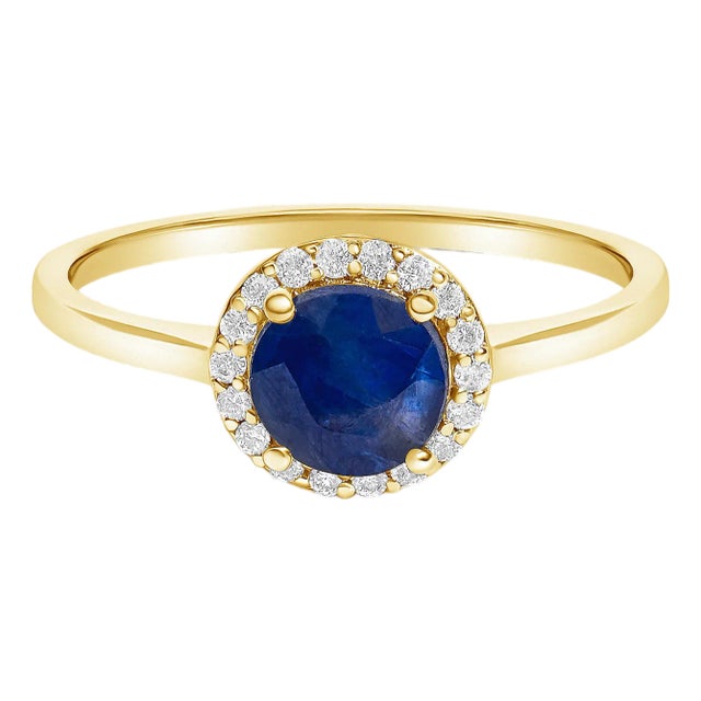 10K Yellow Gold Blue Sapphire and 1/10 Cttw Diamond Halo Ring, Size 6.5 For Sale