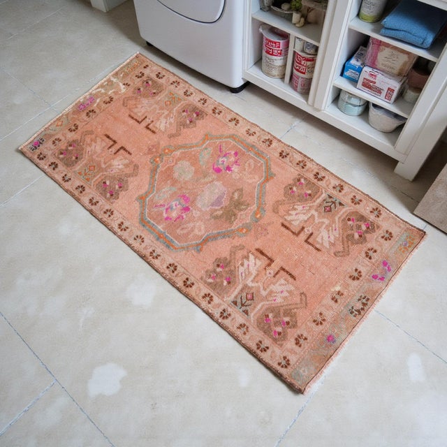 This exquisite hand-knotted vintage Turkish rug brings a touch of timeless Anatolian artistry to any cozy niche or entry...