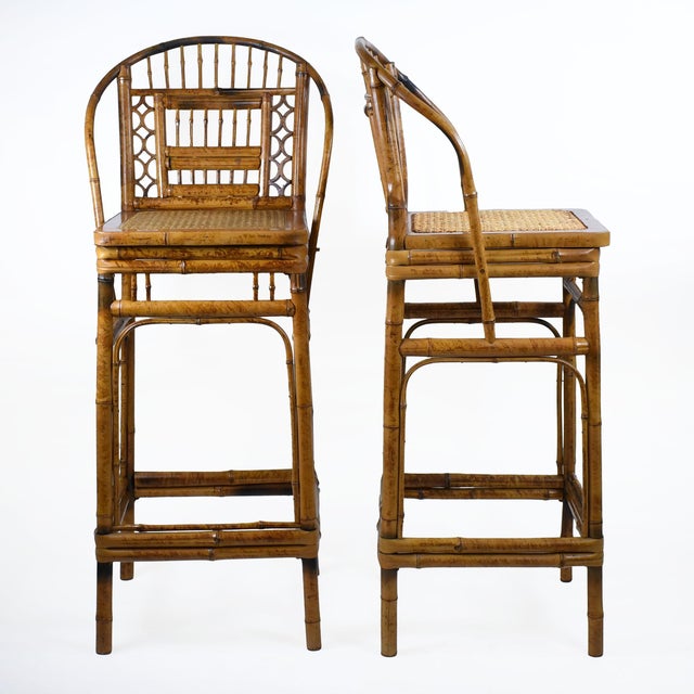 A pair of bamboo Brighton counter stools with tall fretwork backs in the Brighton Pavilion taste. The counter height suits...