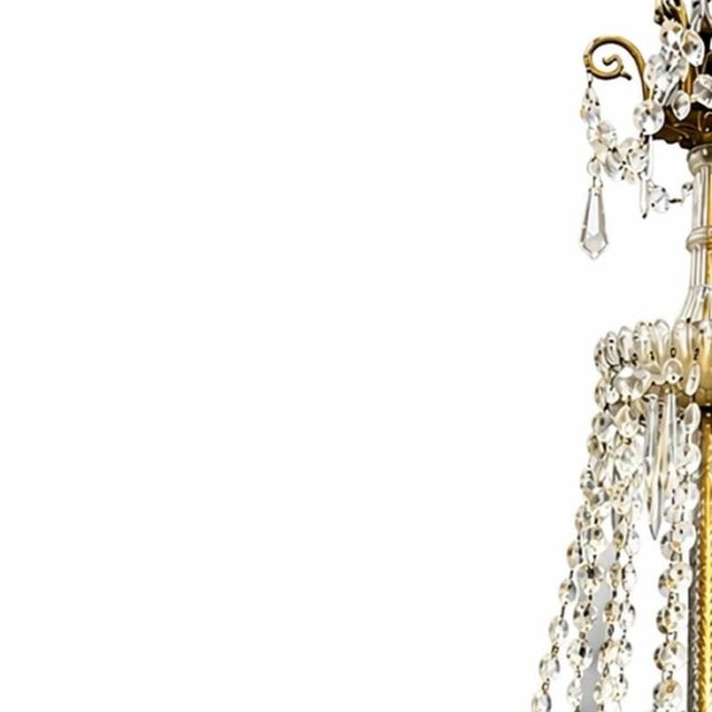 Lighting - Ceiling lamp (120 cm). 20th century Europe; yellow metal structure; column; bobeches and crystal pendants....