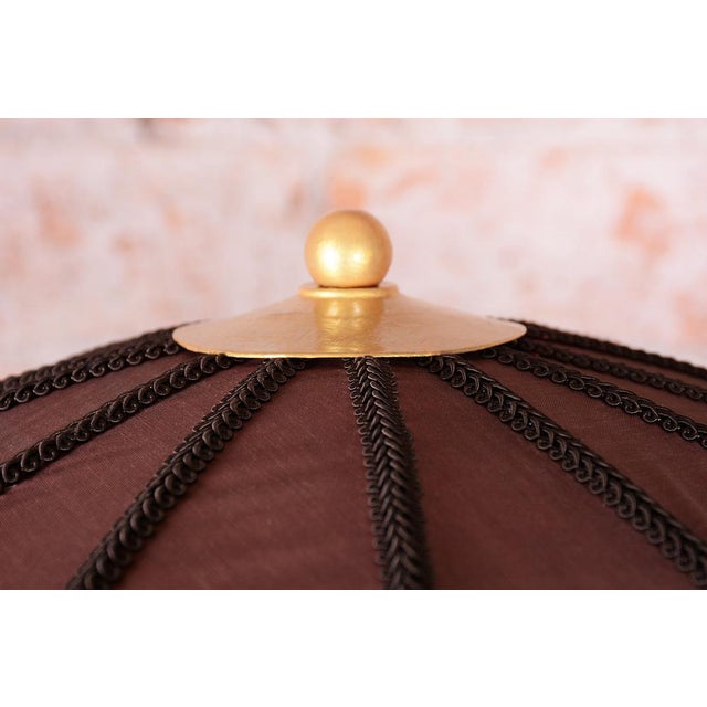 This elegant floor lamp is a prime example of the Art Deco style, originating from Czechoslovakia. It dates back to the...