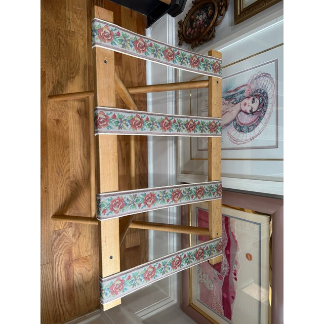 Add a touch of cottage charm to your guest room, bedroom, or vacation home with this vintage folding luggage rack. Crafted...
