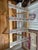 Add a touch of cottage charm to your guest room, bedroom, or vacation home with this vintage folding luggage rack. Crafted...