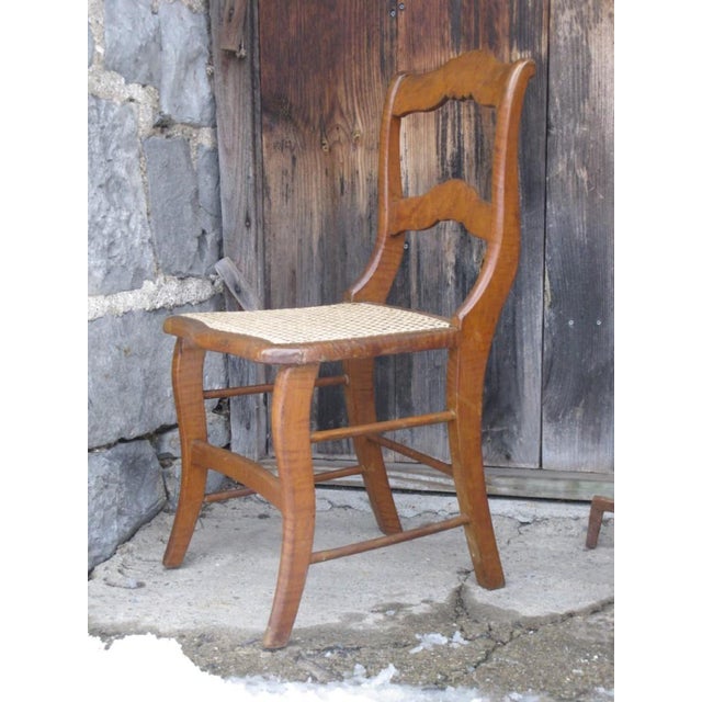 This elegant cottage side chair features a NEW Cane Seat and a frame made of beautiful maple wood, giving it a charming...