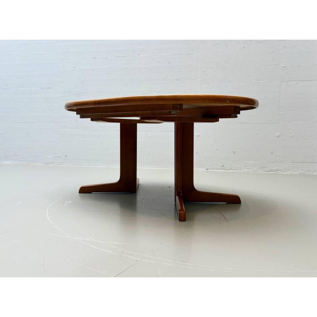 A rare extendable table by dieter wäckerlin, switzerland, designed in the 1960s. The table impresses with its sculptural,...
