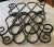 Hand wrought iron wine rack. Fluid design to suit any style room. Holds up to 12 bottles, 2 on the top.