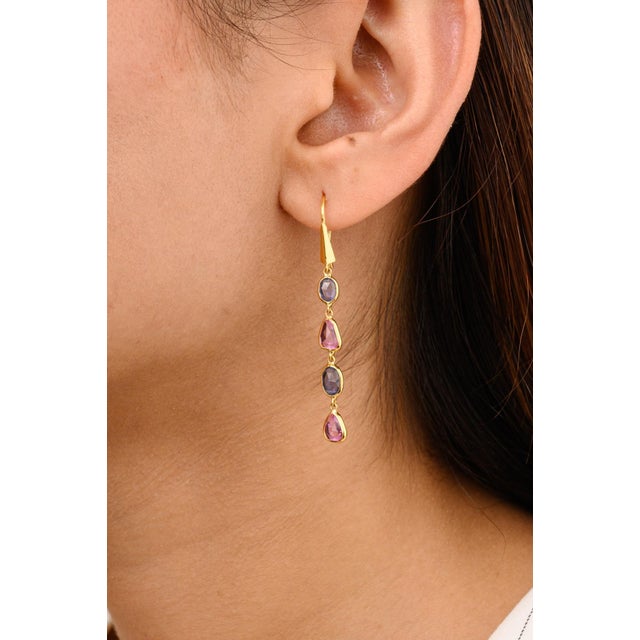 This is part of Chairish’s Fine Jewelry assortment. Indulge in a kaleidoscope of hues with these enchanting multi sapphire...