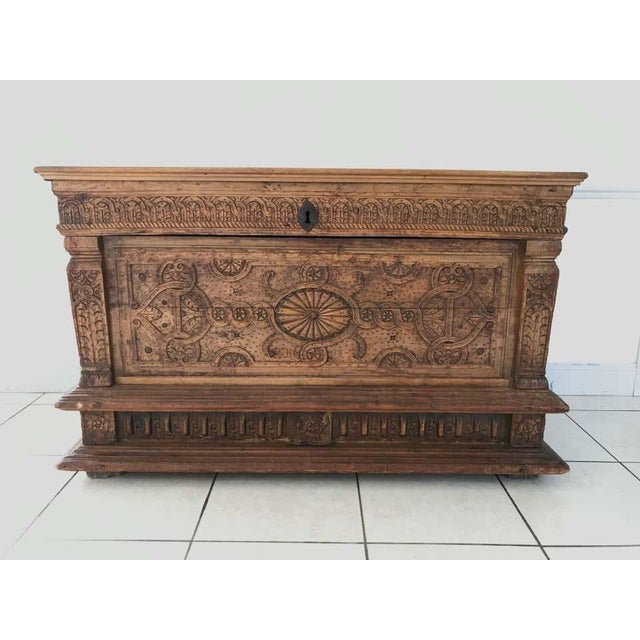 Nice carved wooden chest from the Renaissance period, late 16th early 17th century. The lower part is decorated with a...