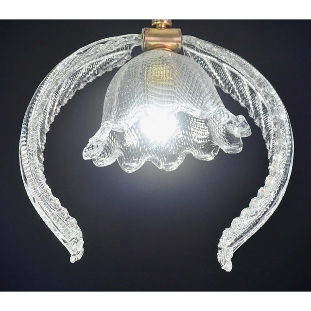 Stunning Murano chandelier by artist Ercole Barovier. It mounts a European standard e27 lamp, possible to rewire for Usa....