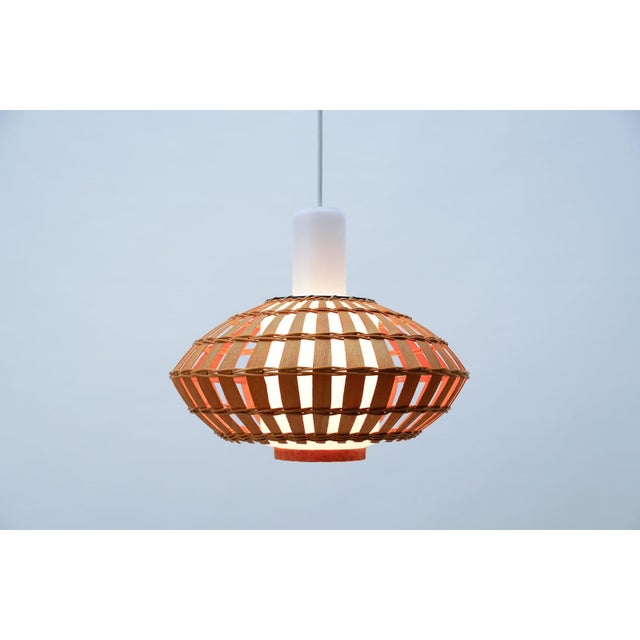 Opaline glass and wicker ceiling lamp, 1960s. fully functional. with an e27 socket. Works with 220v and 110v. wiring is...