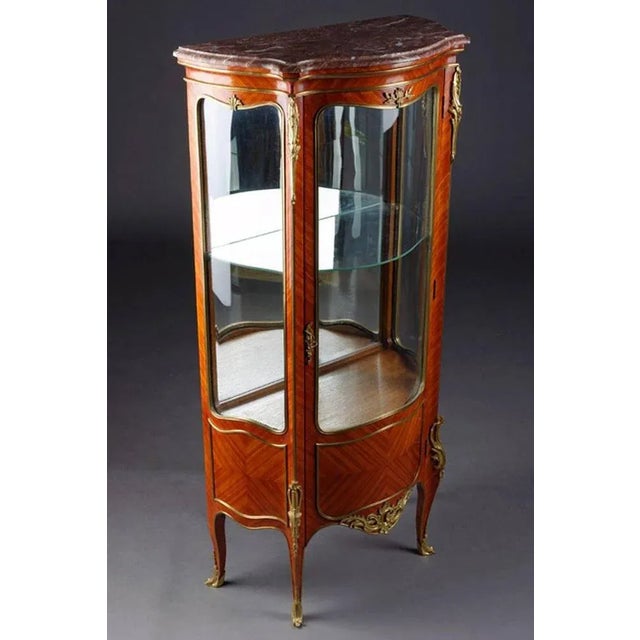 Satin wood veneer on solid pinewood.