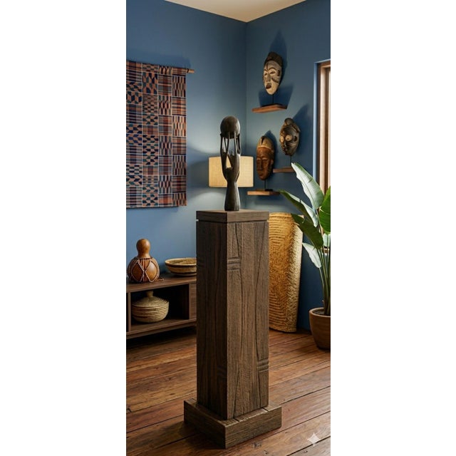This elegant 16-inch “Unity” statue is hand-carved from a single piece of wood in a deep ebony tone, showcasing remarkable...