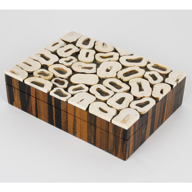 This stunning Art Deco, lidded box was hand-crafted in France in the 1930s. The lid is ornate with bone marquetry. The...