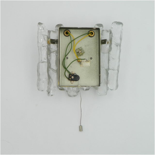 This beautiful sierra 3wa wall light with three glass shades was produced by kalmar vienna in the 1970s. It has a metal...