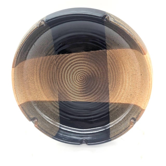 Offered is a vintage, circa. 1970s, glazed stoneware Pottery Craft ashtray made in Compton, California. Key artists that...