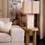 Oak side table with a natural finish and distinctive free-form silhouette. The solid wood construction highlights the...