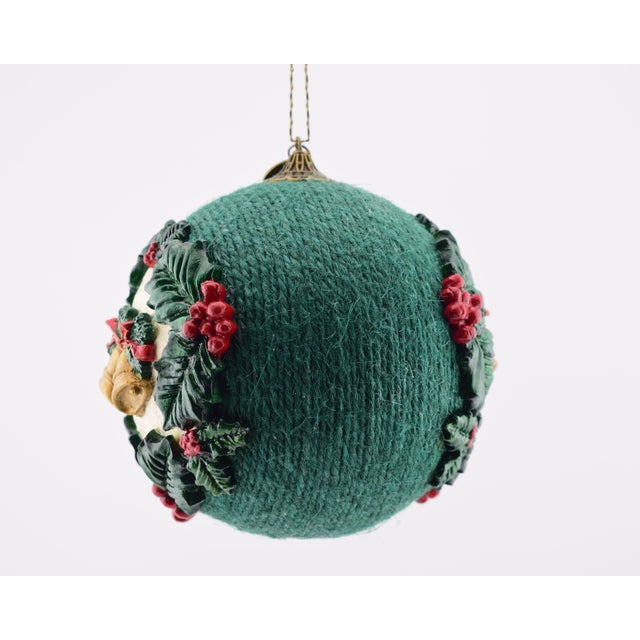 This rustic-style Christmas ornament has been handcrafted and hand-painted, making each one unique. The materials used in...