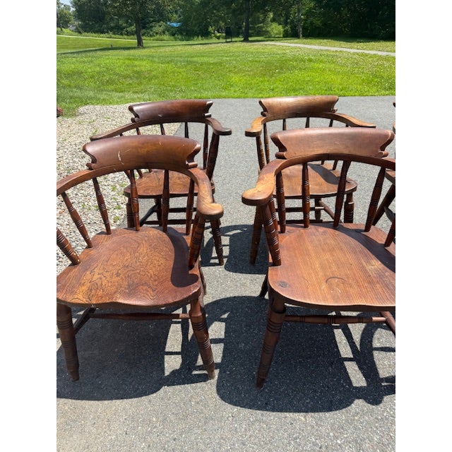 Set of 8 Glenister's Wycombe Smoker's Bow Chairs - sold as a lot of all 8. Presented are 2 sets of 4 chairs. In the photos...
