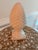 A beautifully sculpted ceramic pine cone finial featuring a crisp diamond pattern and elegant pedestal base. Finished in a...