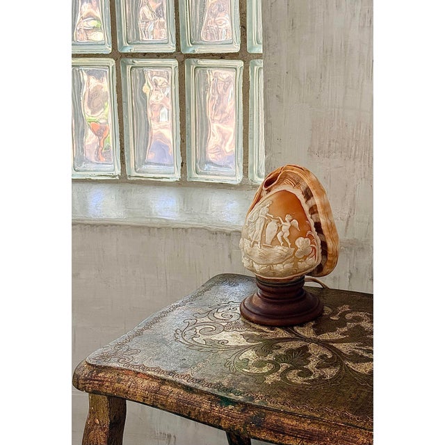 Exquisite Antique Italian Cameo Relief Hand-Carved Sea Conch Shell. Utilizing a Red Mouth Cameo Bull Shell as its canvas,...