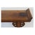 A Chinese hardwood altar table, showcasing the elegance and architectural style associated with traditional Ming dynasty...