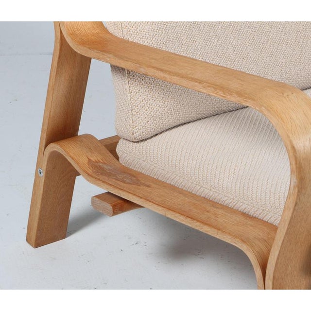 Hans J. Wegner lounge chair made bended oak veener. Cotton cord in back New upholstered with Coda 2 fabric for kvadrat...