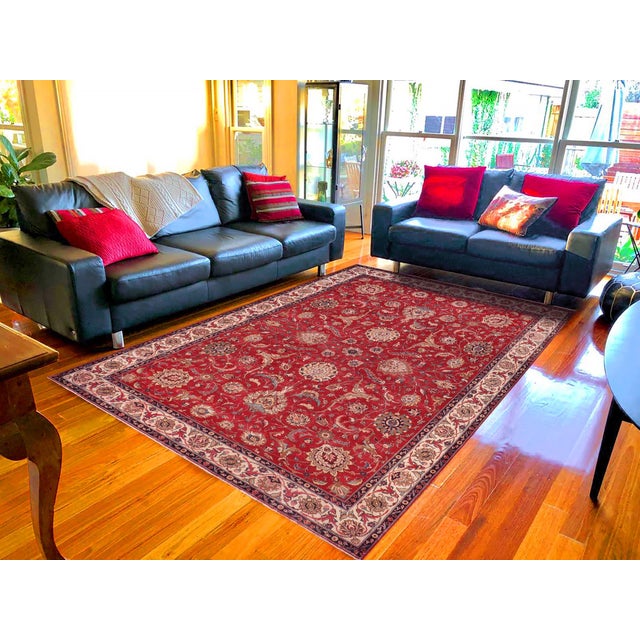 This is a magnificent, hand-knotted wool rug that will instantly elevate the elegance and warmth of any space in your...