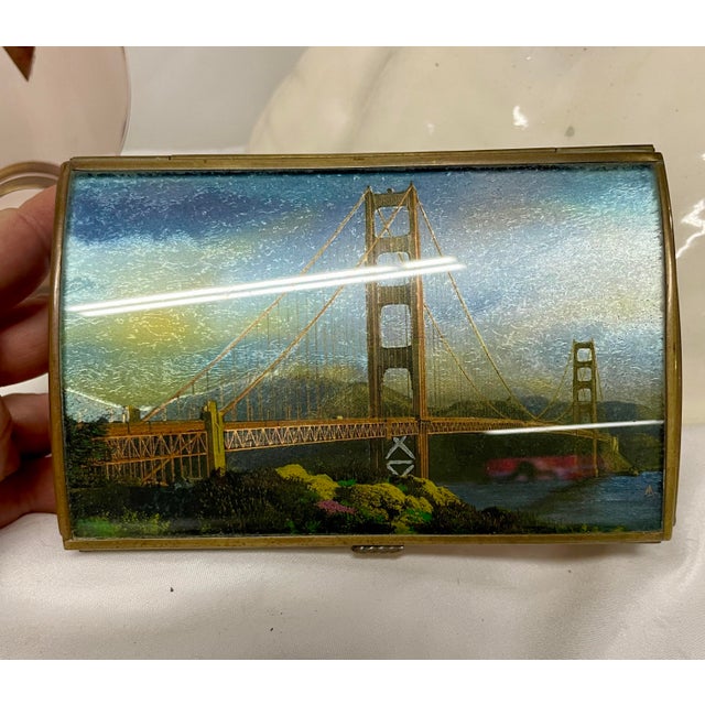 This is a Stunning Brass and Tinted Glass Box that appears to have been a Music Box at one time The Golden Gate Bridge, an...