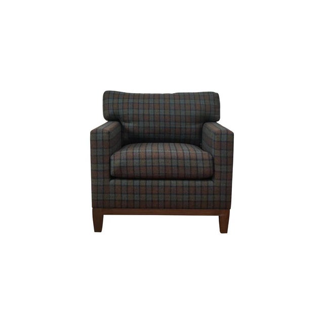 T-back club chair with mahogany stretcher and tapered legs finished in espresso mahogany. Shown in a classic wool plaid by...