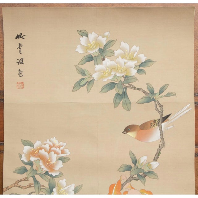 Lovely vintage Japanese silk scroll mounted on paper depicts Long-tailed Rosefinch on the branch of Camellias and Lilies....